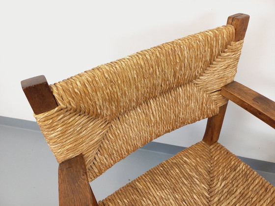 Image 1 of Suite van 2 vintage Brutalistische fauteuils in eiken en stro uit de jaren 60