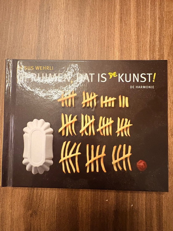 Image 1 of Twee afbeelding op canvas uit “Opruimen, dat is de kunst”