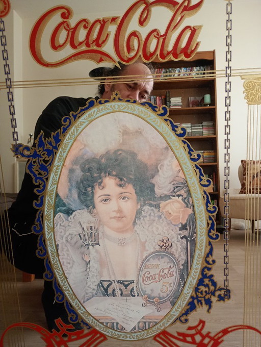 Espejo antiguo de Coca-Cola de más de 50 años.
