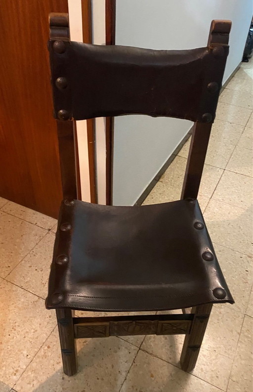 12 Castilian chairs made of wood and leather