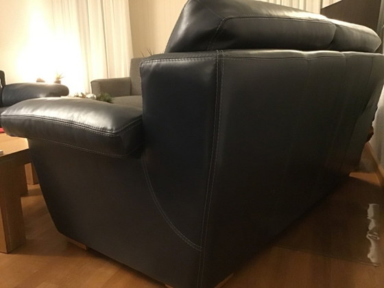 Image 1 of 2 blue leather sofas