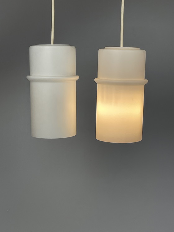 Image 1 of Set van Twee Melkglazen Hanglampen, Raak, Nederland, 1960's