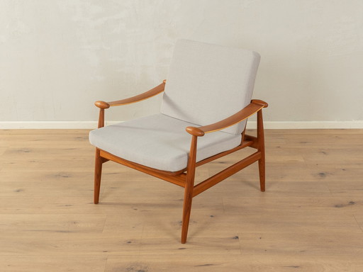 FD 133 "Chaise Spade" de Finn Juhl