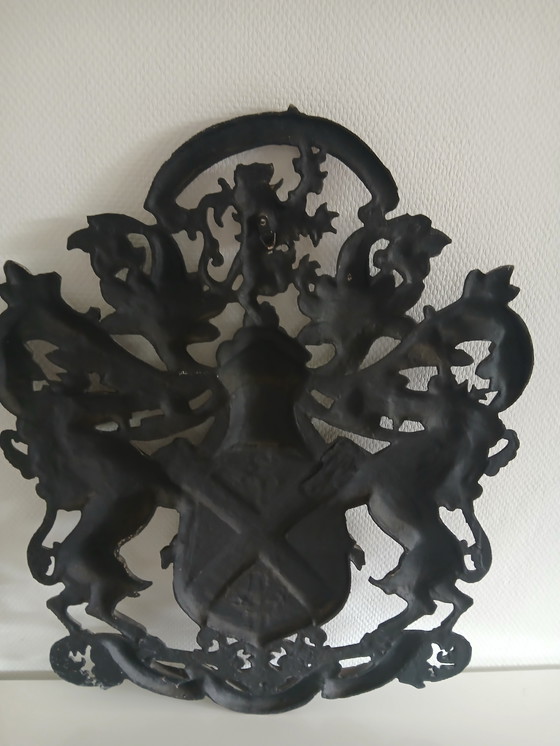 Image 1 of Placa con escudo de armas.