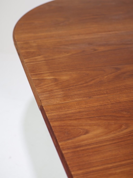 Image 1 of Extendable round dining table oval Danish teak vintage