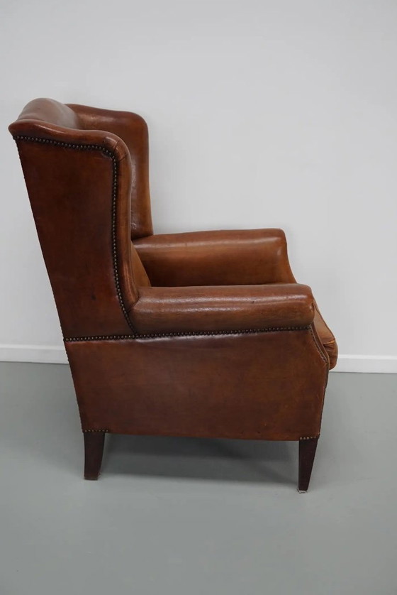Image 1 of Vintage Nederlandse cognackleurige leren clubfauteuil