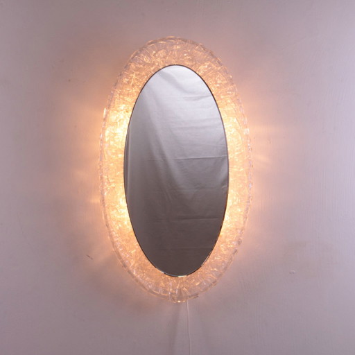 Large Oval Plexiglass mirror with lighting, 1960s Germany.