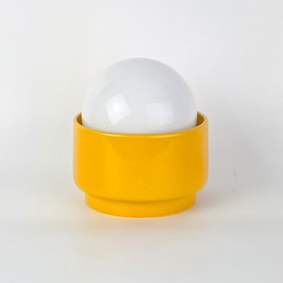 Image 1 of Vintage German ceramic lamp with a glass globe shade. Can be used as a wall lamp, table lamp, or sconce. Yellow. 70s / retro
