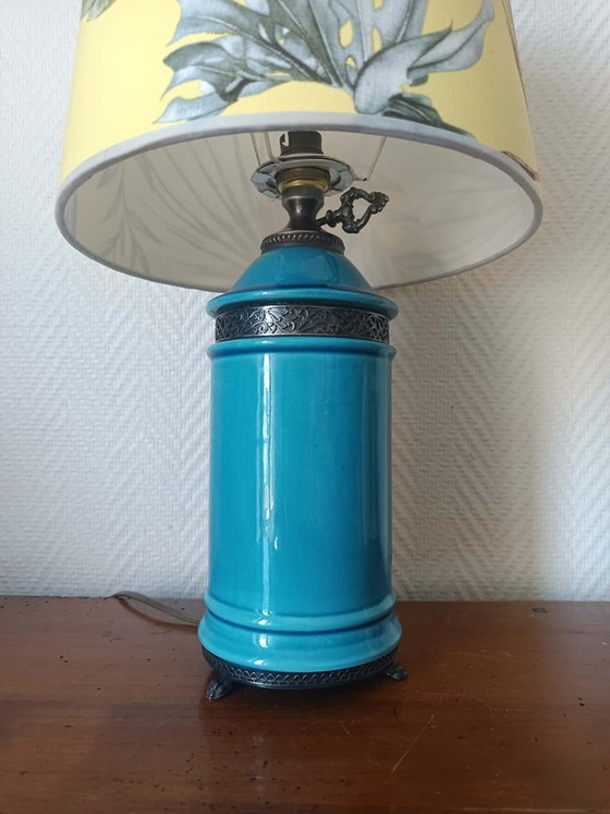 Image 1 of Blue ceramic lamp with claw feet and foliage lampshade