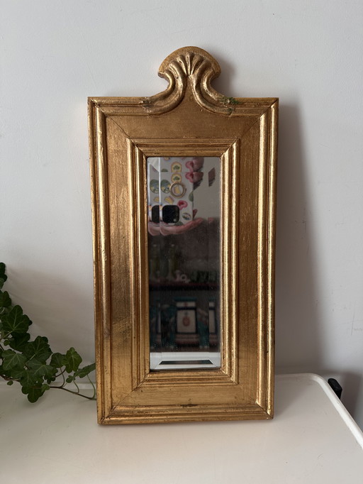 Gold-colored mirror
