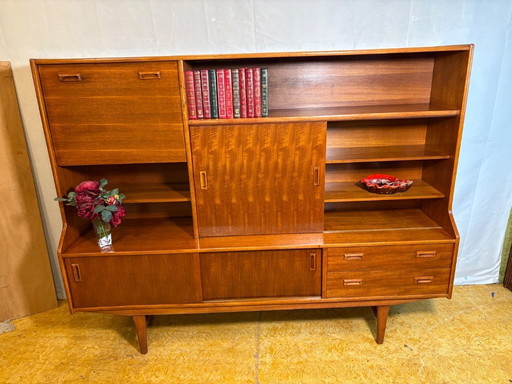 Danish-Style Mid Century Modern Teak Highboard by Elliotts of Newbury (Circa 1960)  A striking mid century modern teak highboard