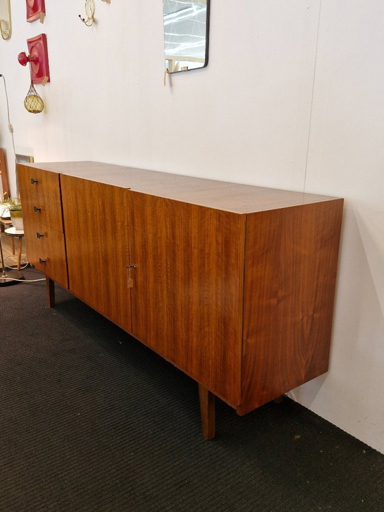 Image 1 of Vintage sideboard teak veneer wooden legs 70s