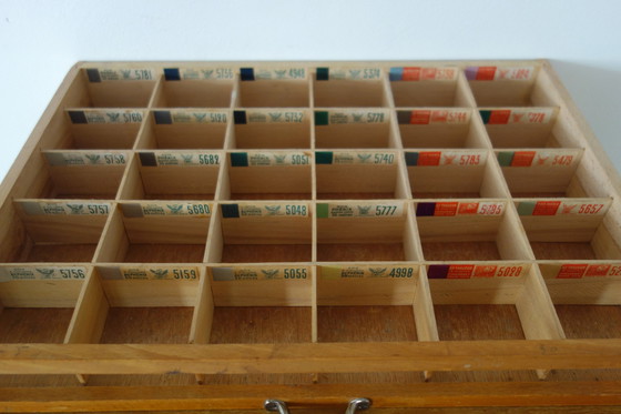 Image 1 of 4-drawer vintage silk haberdashery display cabinet on shelf