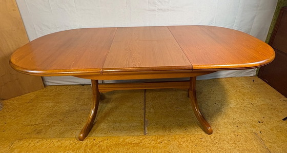 Image 1 of Mid Century Retro Teak Oval Danish Extending Dining Table (Circa 1960–1970)  A stunning mid century modern teak oval extending d
