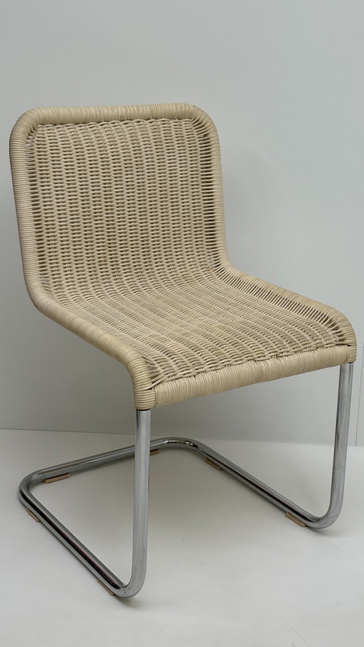 Chaise vintage Tecta design à structure tubulaire beige chromée