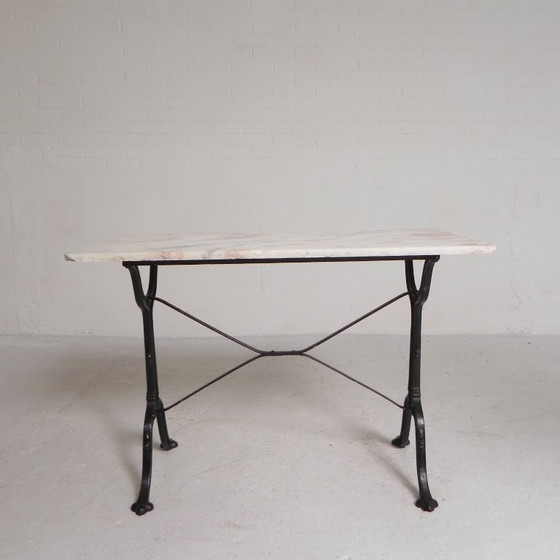 Image 1 of Table de bistrot avec plateau en marbre sur piètement en fonte, PARIS, années 1930
