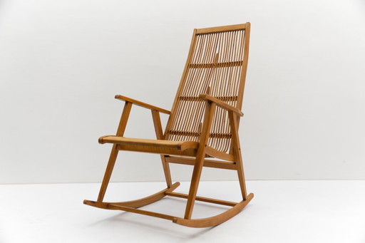 Sedia a dondolo in legno e rattan della Deutsche Werkstätten Hellerau, anni '60