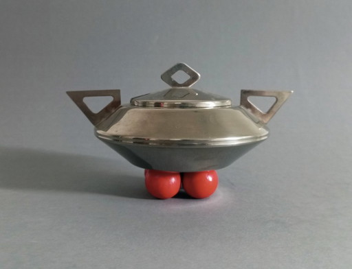 Sucrier postmoderne/futuriste à couvercle, plaqué nickel, reposant sur 4 pieds sphériques rouges, années 1980