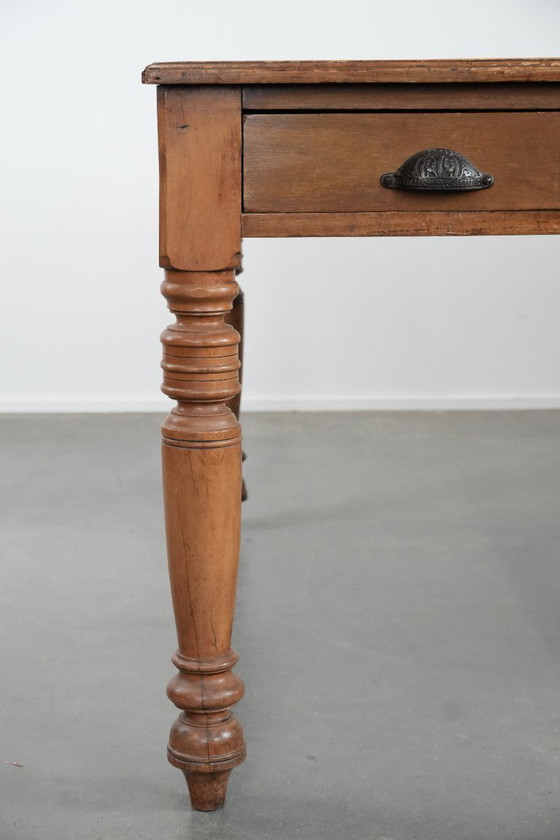 Image 1 of Antique writing table/partner desk with 4 drawers and a green leather top