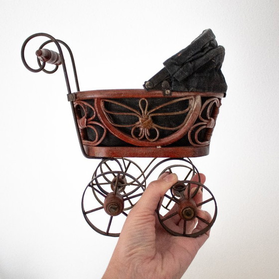 Image 1 of Antique Victorian-style doll pram
