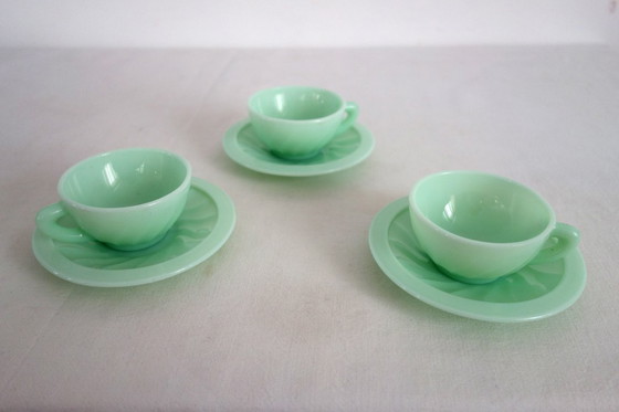 Image 1 of 10 almond green opaline cups and saucers from the 50s