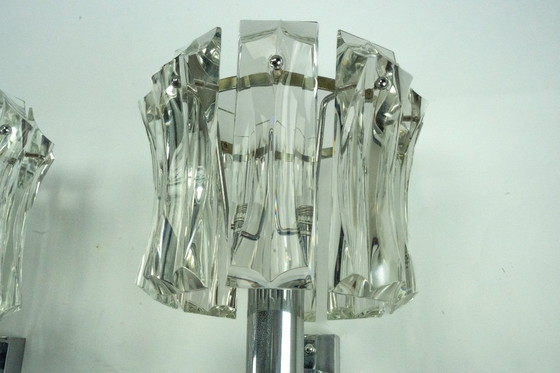 Image 1 of Ensemble de quatre grandes appliques en verre de Murano et en laiton chromé, Italie, années 1960.