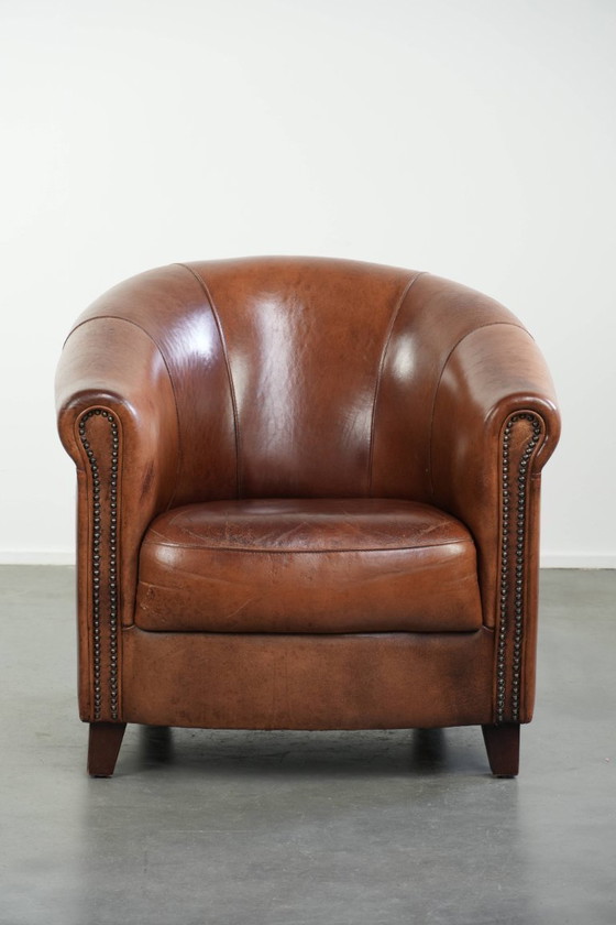 Image 1 of Mooie vintage schapenleren clubfauteuil in Engelse stijl met prachtige diepe kleuren