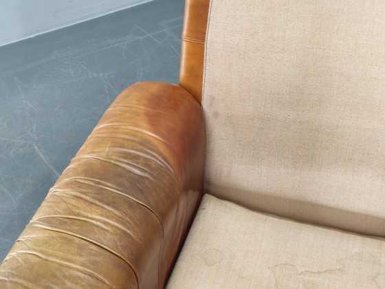 Image 1 of Een paar Arcon Italia loungefauteuils van cognacbruin buffelleer.