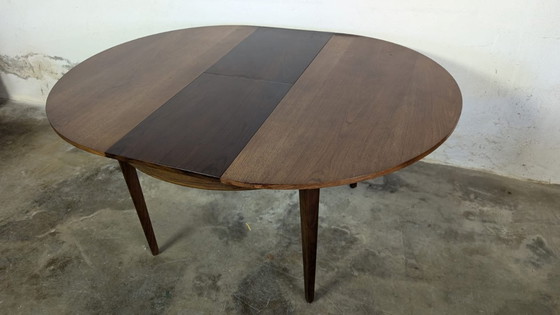 Image 1 of Vintage extendable dining table - round model in teak veneer- mid - Century