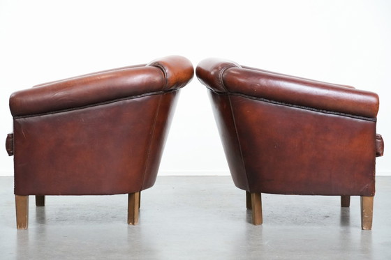 Image 1 of 2 x Vintage schapenleren clubfauteuil met siernagels 