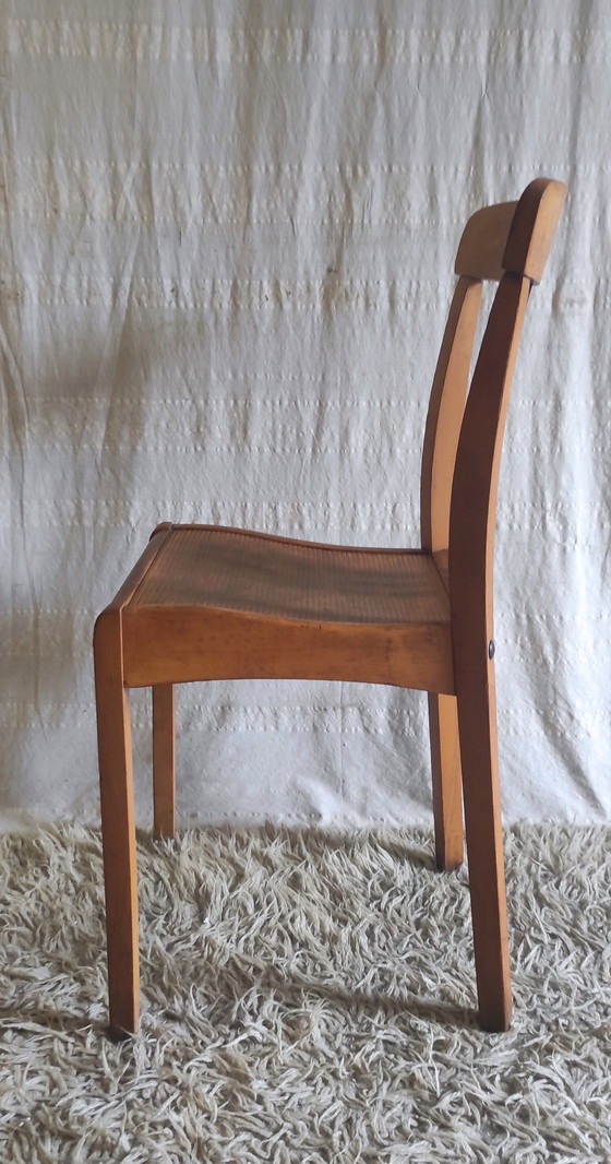Image 1 of Chaise en bois massif par Stella - années 50/60