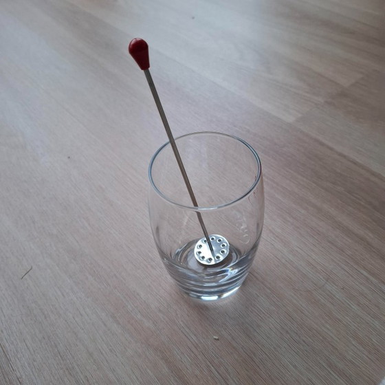 Image 1 of 1950s tonic tampers with rubber caps