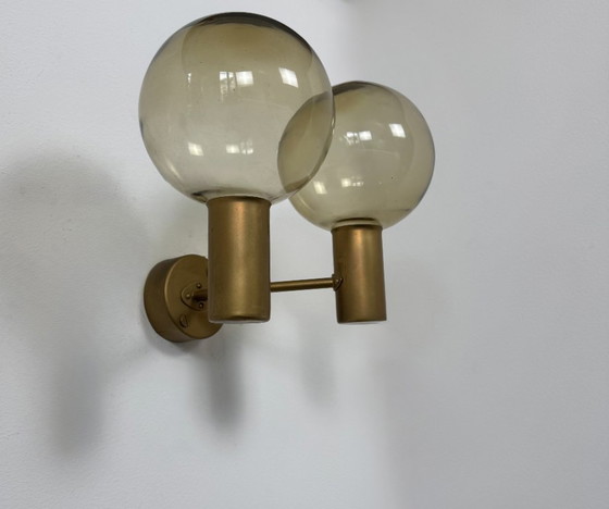 Image 1 of Pair of vintage double wall lights, Hans-Agne Jakobsson model V 149/2, brass and smoked glass, Sweden, 1970
