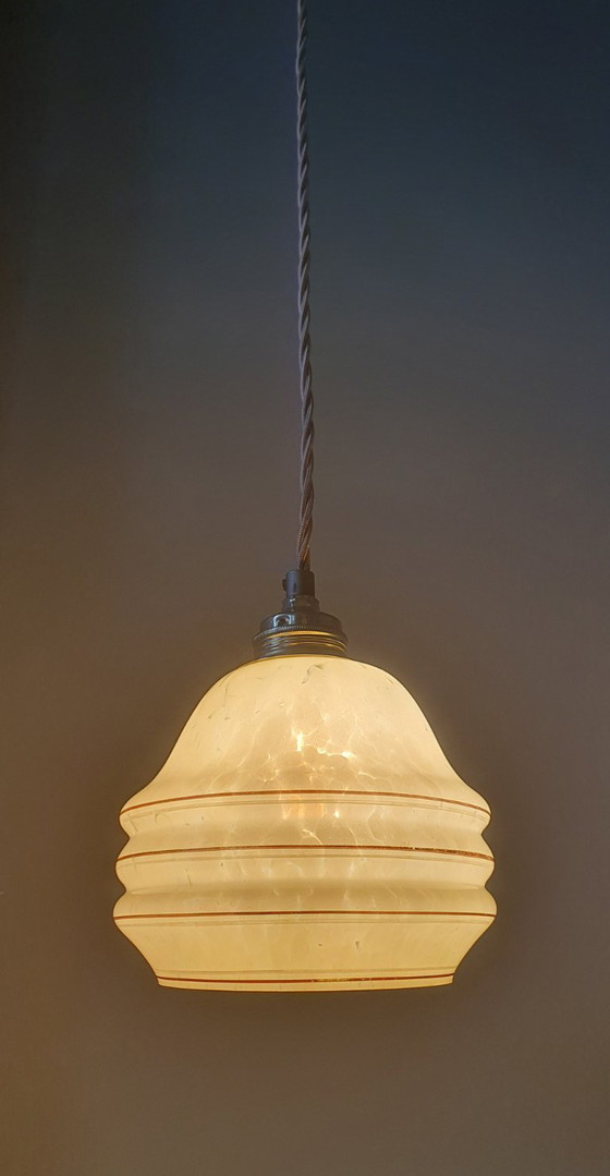 Image 1 of Vintage hanglamp - amberkleurig glas met spots en goudkleurige biezen.