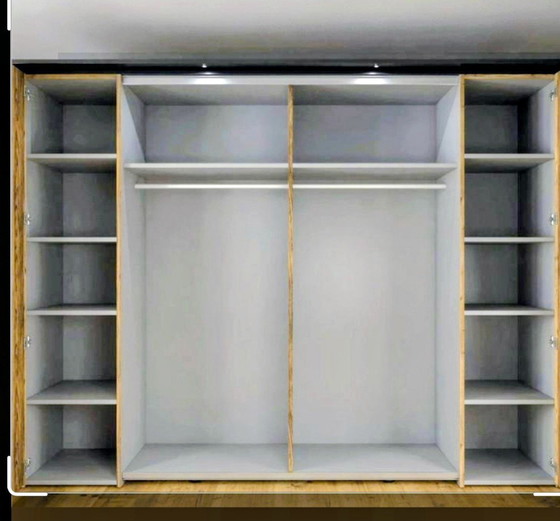 Image 1 of Armadio mobile con ante scorrevoli nero/rovere