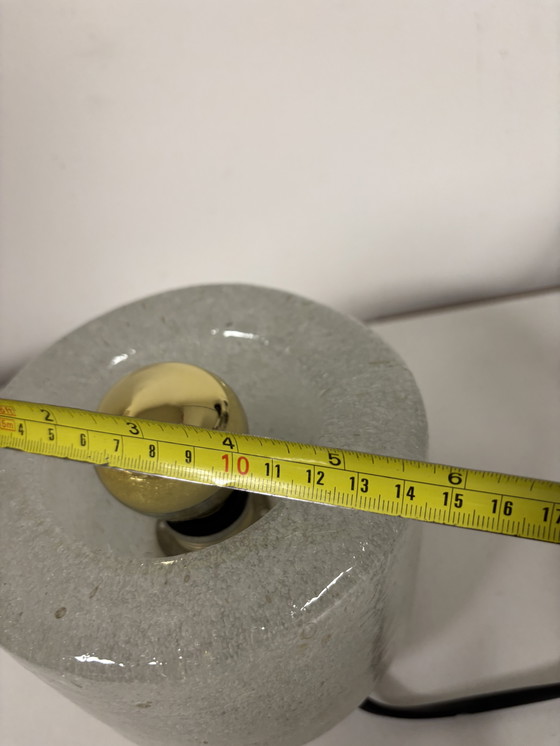 Image 1 of vintage table lamp by Peill & Putzler is made of thick ice glass with brass details