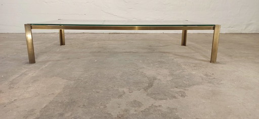 table basse vintage en verre et cadre couleur laiton