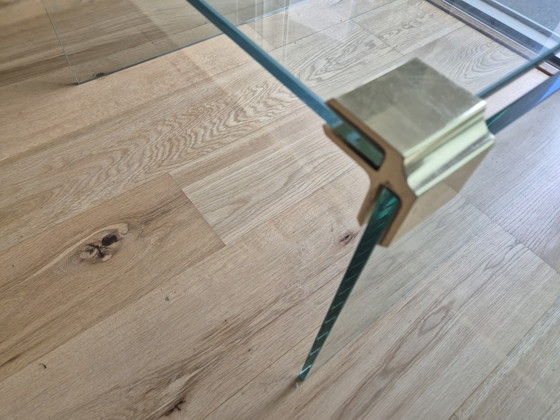 Glass coffee table with brass-colored details. – Side tables (photo 4 of 5)