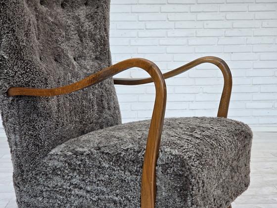 Image 1 of 1960s Reupholstered Danish Armchair with Stool, Genuine Sheepskin