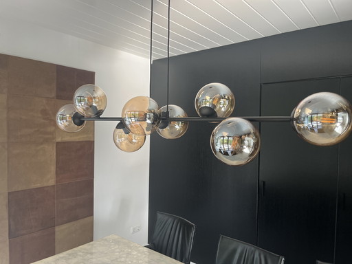 Lampe à suspension pratique en noir mat avec verre ambré