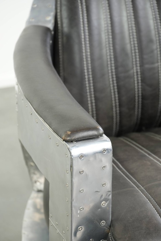 Image 1 of Fauteuil/robinet de style aviateur unique et confortable en cuir de vachette, finitions aluminium et rivets