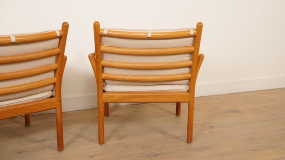 Image 1 of Set van 2 vintage fauteuils | Illum Wikkelsø voor Silkeborg | Model Genius | Teak
