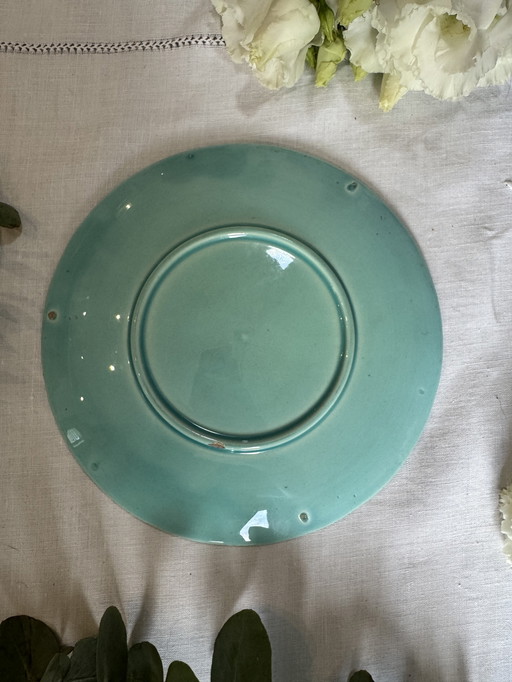 Rara placa de barbotina en forma de golondrina