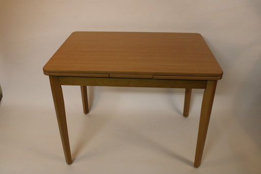 Vintage extendable wooden dining table