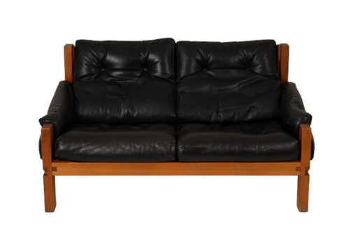 Pierre Chapo. Divano a due posti S22 in olmo e pelle nera. 1970