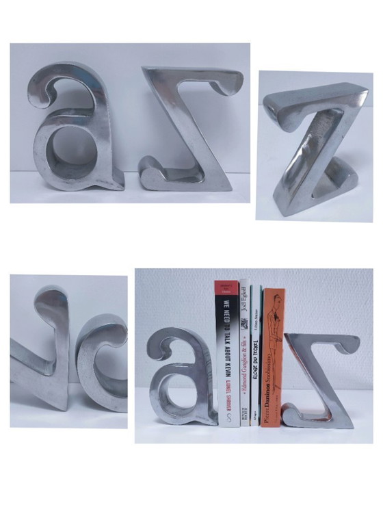 Image 1 of coppia di fermalibri in alluminio pressofuso a forma di "a" e "z"