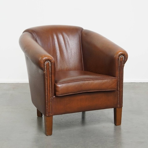 Fauteuil club en cuir de vachette marron de style anglais