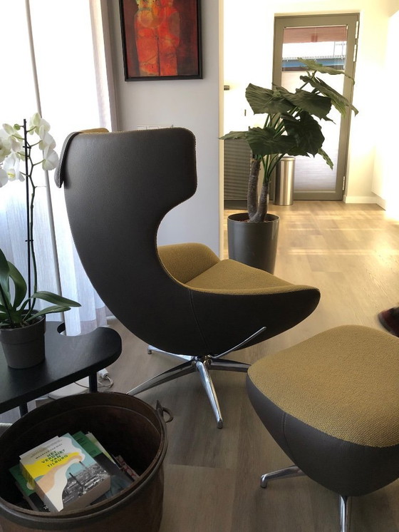 Image 1 of Leolux Carruzo-stoel met poef en hoofdsteun