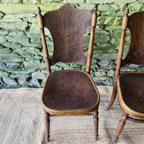 Image 1 of Pair of 2 chairs with relief pattern