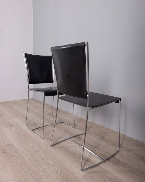 Image 1 of Een paar vintage leren stoelen uit de jaren 90, ontworpen door Segis Italia.